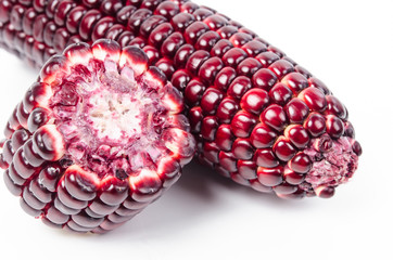 red corn on white background