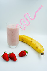 Healthy homemade milkshake. Blend fresh or frozen banana and strawberries and add some milk . Almold, oat or rice milk would work for vegans. No sugar added dessert.