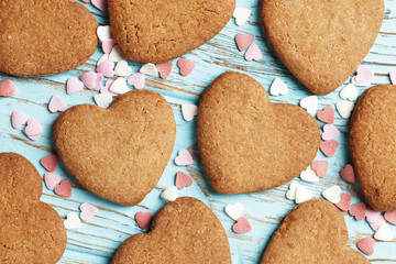 Homemade tasty hearts cookies on wooden background. Top view. Place for text..