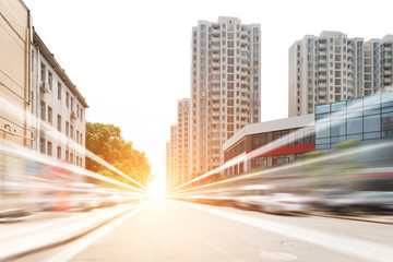 Obraz premium road in city with sunset