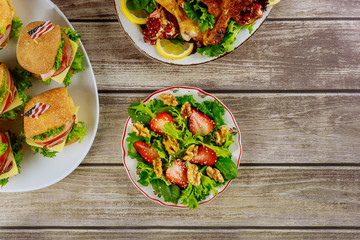 Rustic party table with variety dishes for american holiday.