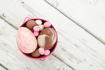 Pink chocolate easter eggs copy space 