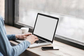 Men typing on computer keyboard. Businessman using laptop in the office. Online internet marketing concept
