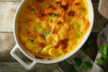 Potato Gratin / Scalloped potatoes close up, selective focus