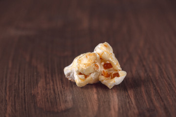 Popcorn close-up on a wooden background
