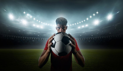 Football player with stadium lights