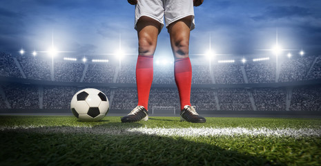 Football player in the stadium