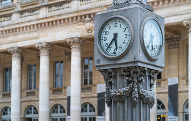 Fototapeta na wymiar Clock with street lamps, La Comedie square, Bordeaux, Nouvelle Aquitaine, France, Europe
