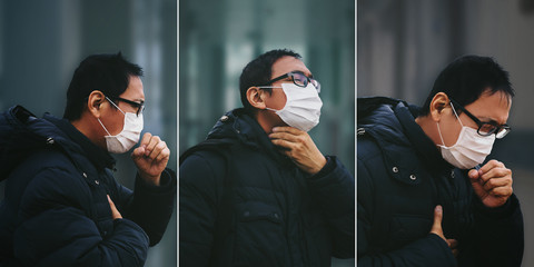 Asian man suffer from cough with face mask protection
