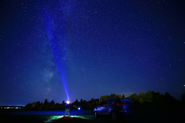 night scenery of a star and a machine, an adventure in the night scenery, the milky way above travelers