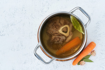 Paleo bone broth diet, beef meat soup. Low-carb food, keto recipe.