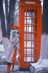 england red phone booth spring girl / london walk portrait englishwoman tourism in britain