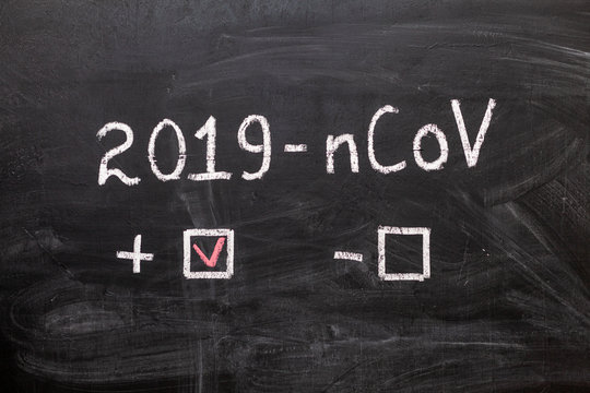 2019-nCoV. The label and the boxes to tick on the chalk Board. Positive or negative. Coronavirus
