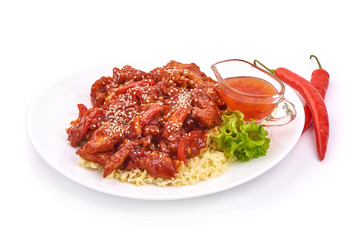 Kung Pao Chicken with rice prepared in wok, Chinese traditional food, isolated on white background