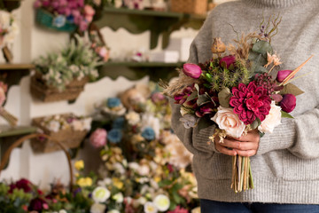 Bouquet flower shop female florist hand holding