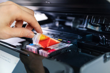 office equipment maintenance and service - hand replace inkjet printer cartridge - obrazy, fototapety, plakaty
