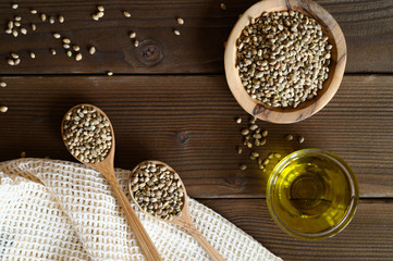 hemp seeds on a wooden background as a healthy food concept. flat lay.