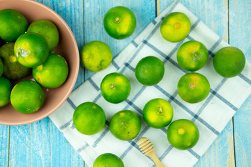Fresh green lime. lime is very sour for cook the Thai food style