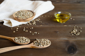 hemp seeds on a wooden background as a healthy food concept
