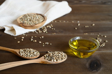 hemp seeds on a wooden background as a healthy food concept