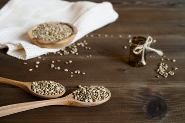 hemp seeds on a wooden background as a healthy food concept