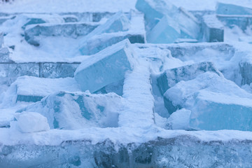 Closeup view of destroyed Ice brick wall, background. Ice block
