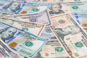 Fototapeta na wymiar USA american dollars banknotes background close up