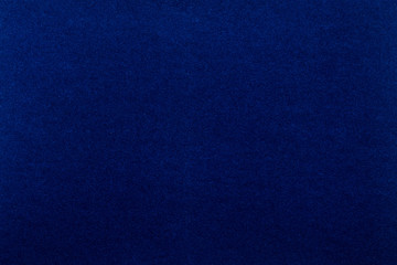 Blue background. Velvet paper texture.