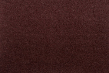 Fototapeta premium Brown background. Velvet paper texture.