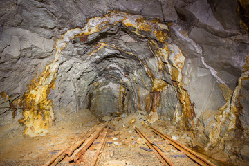 Old gold mine underground tunnel - obrazy, fototapety, plakaty