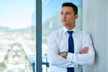Fototapeta premium Confident young executive with a vison of success