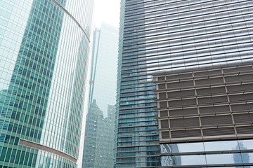 Modern glass silhouettes of skyscrapers in the city
