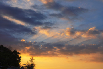 Sky with cloud and sun ray yellow and blue color background. With copy space for text or design.