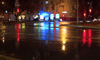 Fototapeta na wymiar Night city traffic lights. Rainy