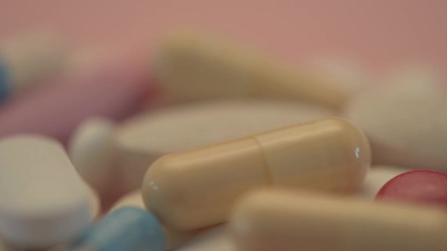 Various medicine pills and tablets, close up dolly shot