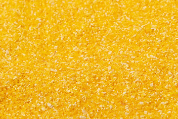 corn grits background texture close-up. dry cereals