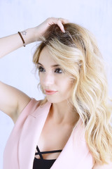 Obraz premium professional make-up model studio / model posing in studio with bright fresh make-up, beautiful eyes and lips with makeup
