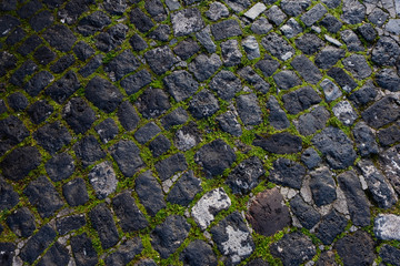 Pavement road made of volcanic lava rock stone, pumice