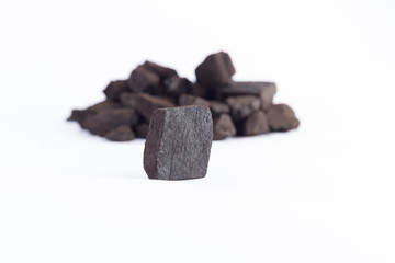 black coal on a white background