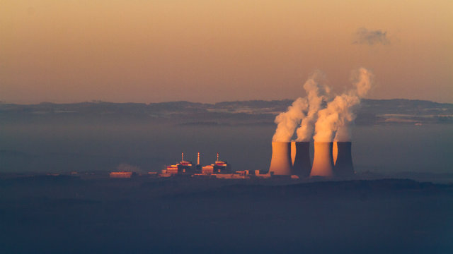 steam coming up from nuclear power plant in the morning