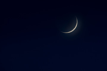 Obraz na płótnie Canvas the Moon in early waxing lunar phase 
