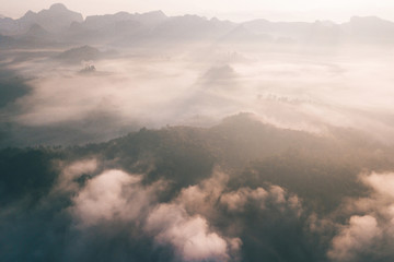 The morning mist Thailand mountains covered with fog sunrise time