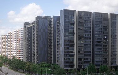 Condominium and government housings with blue clear sky