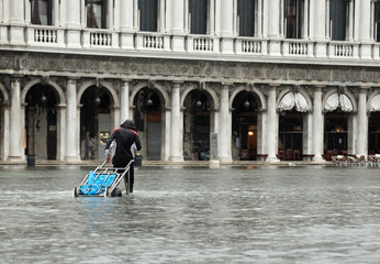 Porter on the water in Saint Mark in Venice Italy