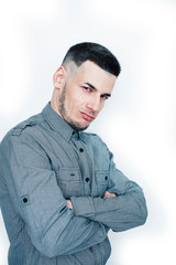 young handsome well groomed guy posing on white background gesturing smiling, lifestyle people concept