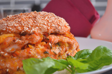 Thanksgiving, holiday, dinner. Cupcake casserole with chicken, carrots, onions and cheese on a wooden table. Food concept on a festive table.