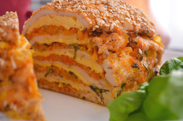Thanksgiving, holiday, dinner. Cupcake casserole with chicken, carrots, onions and cheese on a wooden table. Food concept on a festive table.