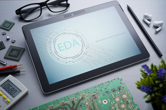 Industrial 4.0 concept on EDA Electronic Design Automation with a simple Illustrative of circuit board written on tablet PC with electronic instrument