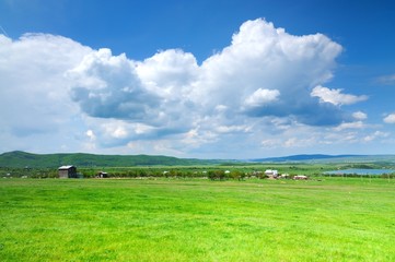 Mountain landscape and small village in distance