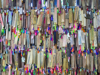 Colorful name tags that tourists write and hang.
